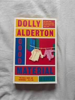 Good Material by — Paperback Novel in Pink and Cream Cover